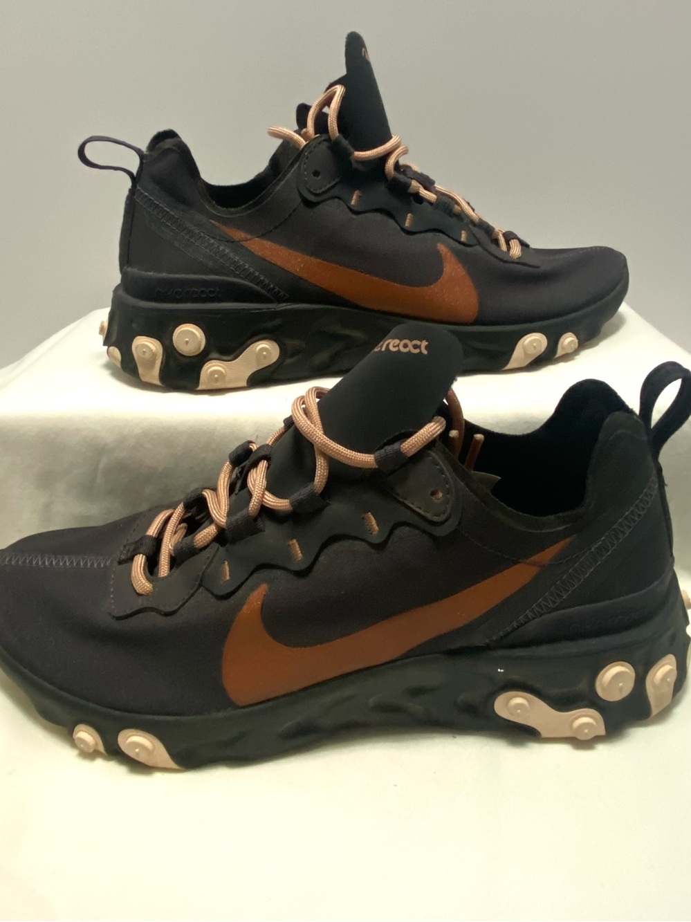 Nike Women's Black Sneakers with Copper Swoosh